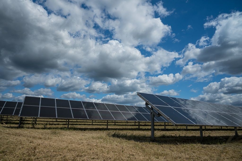 solar-panels-used-renewable-energy-field-sky-full-clouds.jpg