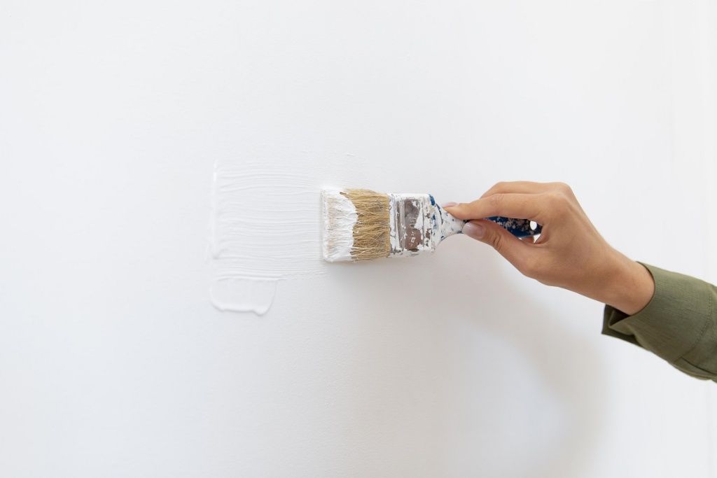 close-up-hand-holding-brush.jpg